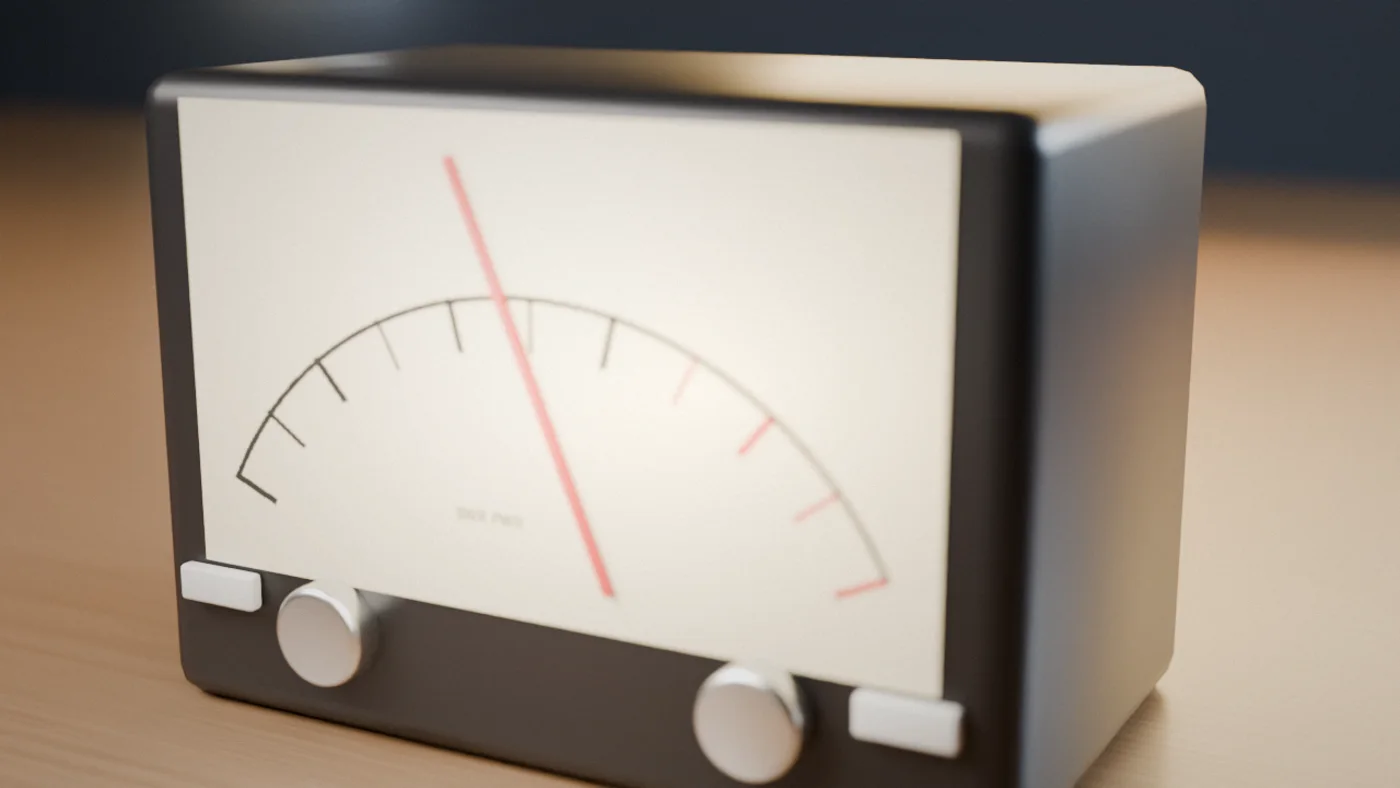 An analog gauge on a desk, like a cockpit instrument