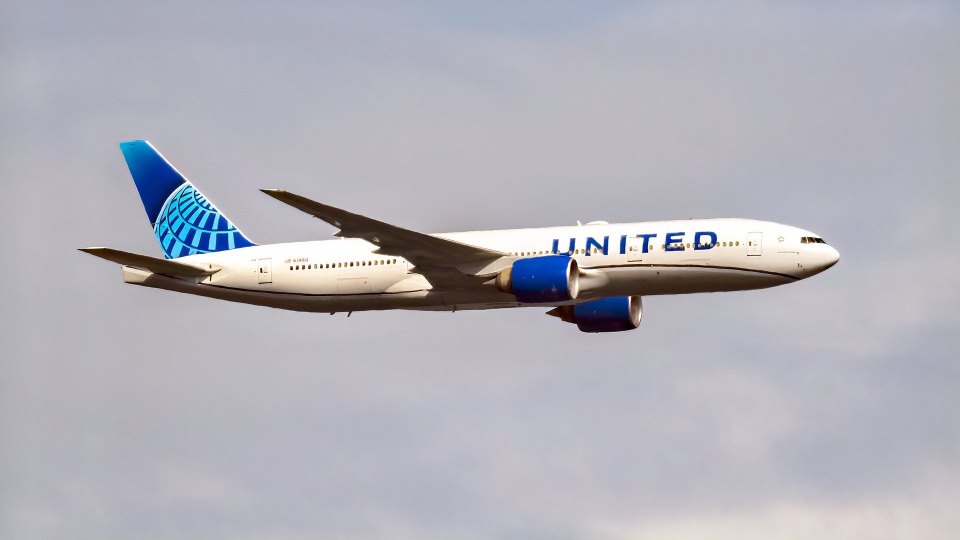 Drunk United Airlines Passenger Tries To Open Door Mid-Flight, Then Bites Flight Attendant