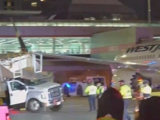 WestJet plane collides with catering truck at Pearson airport